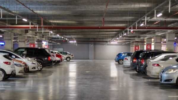 lines of cars in storage